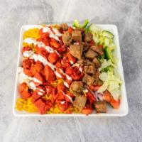 Lamb Chicken Combo · Lamb & Chicken Over seasoned Basmati Rice with Side Salad of lettuce, tomato, cucumber, and ...