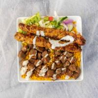 Lamb Kabab Combo · Lamb & Chicken Over seasoned Basmati Rice with Side Salad of lettuce, tomato, cucumber, and ...
