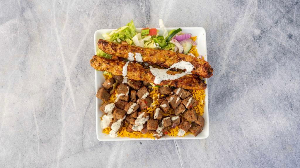 Lamb Kabab Combo · Lamb & Chicken Over seasoned Basmati Rice with Side Salad of lettuce, tomato, cucumber, and onion. Gluten free. Choice of any or all white, red, green sauce.