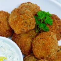 Side Of Falafel · Get 6 delicious homemade balls of gluten free fried falafel to complement your order.