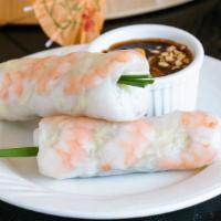Shrimp Rolls · Two pieces. Goi cuon tom. Shrimp wrapped in rice paper with rice noodles, lettuce, basil, an...