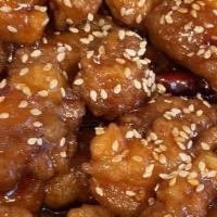 Sesame Chicken · Hot & spicy. Chicken deep fried then sauteed with sesame seeds in brown sauce.