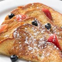 Busboys And Poets French Toast · Challah bread, milk, cinnamon/egg mix, powdered sugar, local maple syrup.  Garnished with fr...
