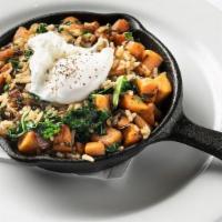 Sweet Potato Hash · Roasted sweet potato, kale, onions, poached organic free-range egg, brown rice served in a h...