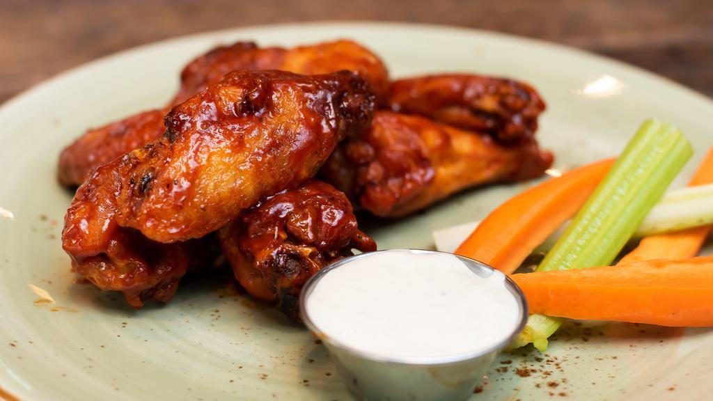 Wings Inferno · Choice of half or one dozen chicken wings  (flats/drums), inferno sauce (hot sauce/BBQ sauce), carrots, celery, blue cheese dressing (Gluten-Free Friendly). The chicken is halal.