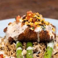 Blackened Salmon · 8 ounce grilled salmon fillet cooked medium well, lemon butter sauce, wild rice, asparagus, ...