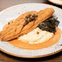 Fried Catfish · 10oz fried catfish fillet served with capers, collard greens, herb grits, and tomato coulis ...