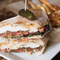 Chicken Panini · Grilled chicken, pepper jack cheese, caramelized onion, spinach, tomato, chipotle mayo, ciab...