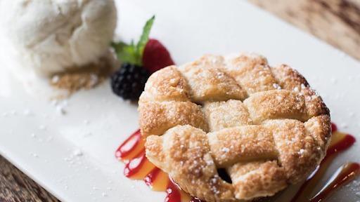Apple Pie W/ Vanilla Ice Cream · Warm, housemade mini apple pie, vanilla ice cream. Possible Allergies: Dairy, Gluten.