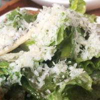 Caesar Salad · Romaine hearts,  anchovy vinaigrette.