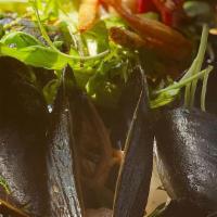 Mussels · Steamed in white wine, garlic and herbs