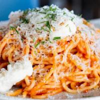 Spaghetti Pomodoro · Vegetarian. Burrata, Basil, Parmesan, Breadcrumbs.