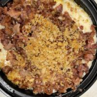 Bacon Mac N' Cheese · Homemade with bacon bites, melted cheese on top with seasoned bread crumbs.