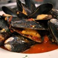 Mussels · In a spicy marinara or white wine sauce.