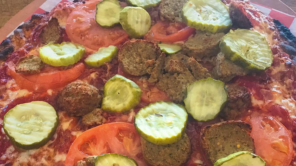 Cheeseburger Pizza (Not Fast Food) · Ketchup, mustard, white onion, sliced tomato, sliced pickles, bacon, sliced meatball, sliced pickles, our cheese blend.