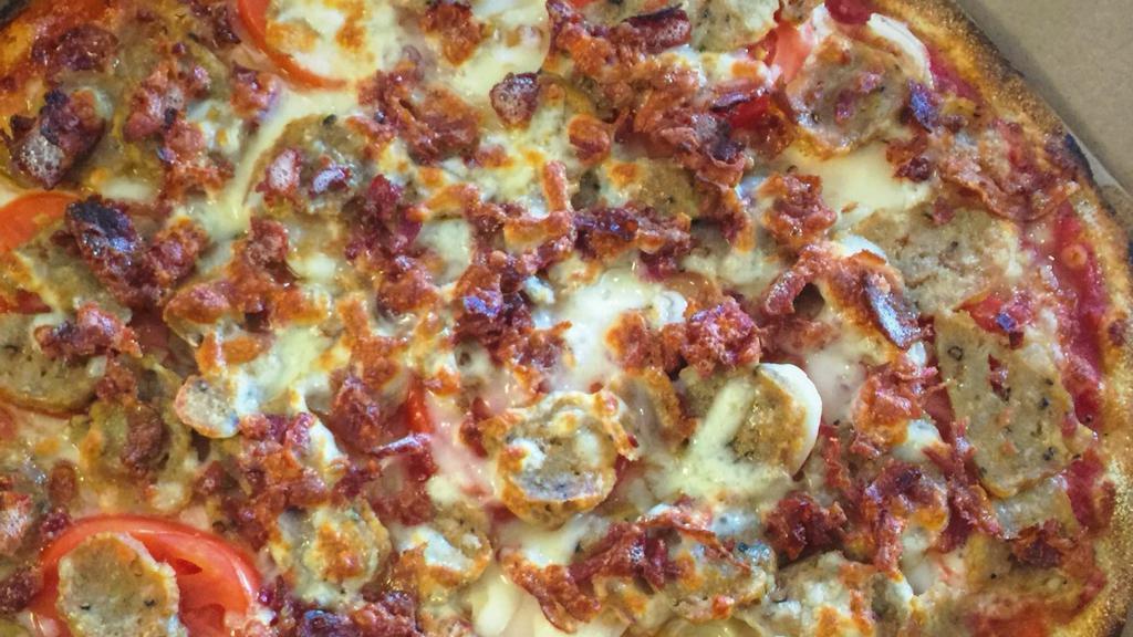 Sunrise Pie (Meats & Veggies) · Charbroiled Italian sausage, apple wood smoked bacon, sliced tomato, sliced potato, white onion, our cheese blend.