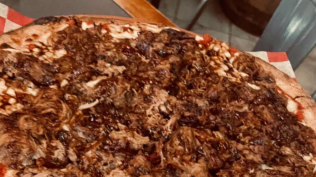 Bbq Pulled~Pork Extreme! (New) · LOADED with FULL pound low & slow smoked pulled pork & our BBQ sauce on top of our traditional cheese pizza makes this offering EXTREME!
