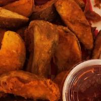 Potato Wedges (Lightly Seasoned) · A Full Pound of jo~jo style seasoned potato wedges!
Served with ketchup on the  side