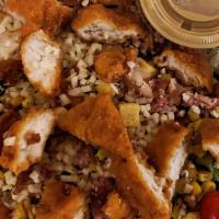 Crispy~Chicken Salad · House salad with fire roasted corn, applewood smoked bacon, sliced breaded chicken tenders, ...