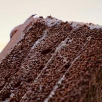 Awesome Chocolate Cake! (Slice) · Chocolate fudge layered cake!
Irresistibly moist rich and delicious!
Topped with Hersheys ch...