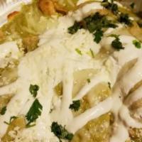 Enchiladas Mexicanas · Green sauce Mexican enchiladas served with rice and beans and choice of chicken, beef or por...