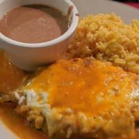 Chiles Rellenos · Stuffed peppers. Ground beef and cheese. Served with beans and rice.
