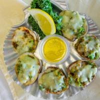 Clams Casino · Six top neck clams minced with house pepper mix topped with bacon and mozzarella cheese.