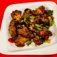 Salt & Spicy Chicken Wings · Sauteed with red & green pepper, onion and black pepper.
(no rice)