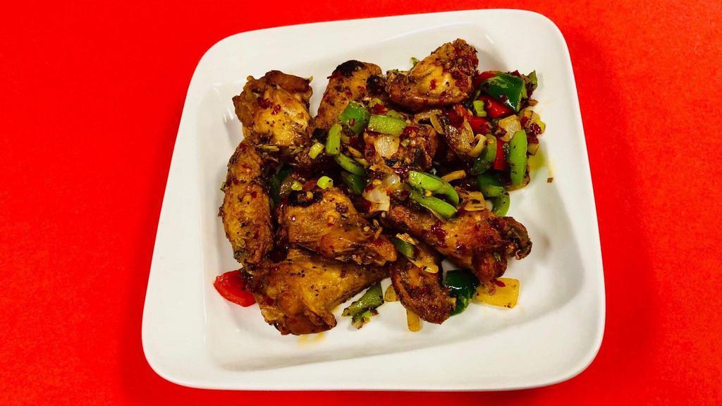 Salt & Spicy Chicken Wings · Sauteed with red & green pepper, onion and black pepper.
(no rice)