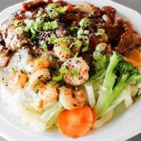 Chicken, Beef & Shrimp Combo · Served with mixed vegetables.