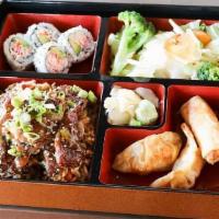 Beef Bento · Served with mixed vegetables. Four pieces California roll, two pieces chicken dumpling, and ...