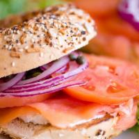 Lox Sandwich · Smoked salmon with cream cheese, topped with tomato, red onion, and capers, served closed-fa...