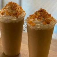 Porridge Smoothie · Vanilla coffee, Almond milk, (sugar Cinnamon nutmeg vanilla) with a corn flake cinnamon suga...