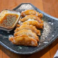Gyoza · Vegetable or pork dumplings served with Waku apple soy sauce, six pieces. Choose: steamed or...