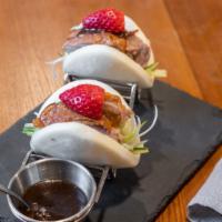 Samurai Duck Bun · Roasted duck with cucumber, scallion and duck soy sauce, two pieces.
