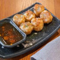 Shumai · Shrimp shumai served with house soy sauce, six pieces. Choose: steamed or fried.