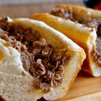 Philly Cheesesteak · Fried onions and American cheese.