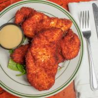 Chicken Tenders · Hand-breaded tenders served with honey mustard, BBQ, or Buffalo sauce.
