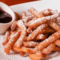 Funnel Cake Fries · Covered in powdered sugar, served with chocolate and raspberry sauce.