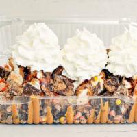 Reese'S Supreme · Vanilla soft serve, reese's pieces, peanut butter cups, hot fudge, peanut butter sauce and w...