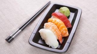 Nigiri Appetizer · 4 pieces of assorted filets of raw fish on rice.
