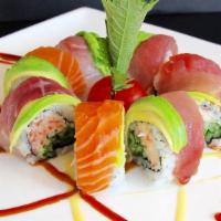 Rainbow Marki · Crab stick, tobiko, cucumber, and mayo topped with layer of tuna, salmon, white fish, and av...