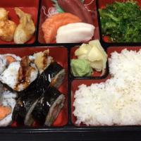 Sushi Bento Box (2) · A combination of California maki, crazy maki, seaweed salad, crab rangoon, egg roll, gyoza, ...