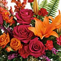 Punch Of Color Bouquet · Hot pink roses, orange spray roses, orange Asiatic lilies, hot pink carnations, red miniatur...
