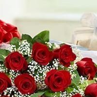 1 Doz Long Stemmed Red Roses Wrapped · 1 Doz Beautiful Long Stemmed Red Roses Wrapped With a Bow
