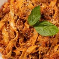 Bolognese · Tomato Sauce, Red Wine, Ground Beef, Diced Celery, Carrot, Onion, Garlic & Cumin (can’t be m...