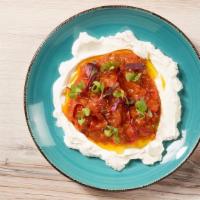 Labneh Matbucha · Labneh, Matbucha (Slow cooked Tomatoes and Peppers Stew).. Served with 1 Pita