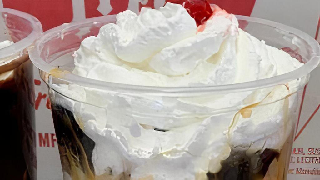 T-Hoye Sundae · 3 scoops of peanut butter cup ice cream, real peanut butter and hot fudge, whipped cream and a cherry.