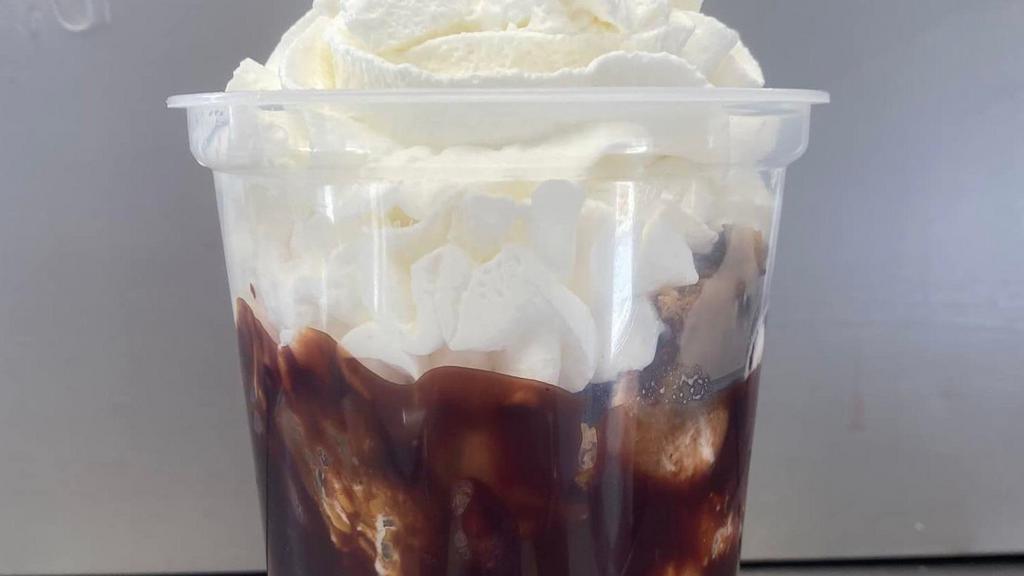 Brownie Sundae · 3 scoops of vanilla ice cream, warm homemade brownie and hot fudge, topped with whipped cream and a cherry.