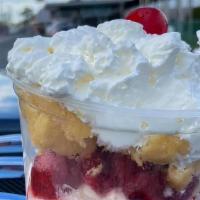 Strawberry Shortcake Sundae · 1 scoop of vanilla ice cream, 1 scoop of strawberry ice cream and 1 scoop of strawberry chee...